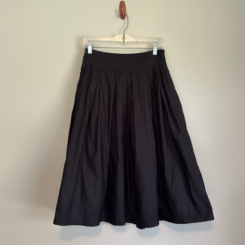 Black pleated midi skirt